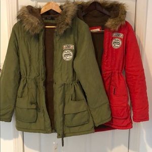Two New hooded jackets. String cinches waist.